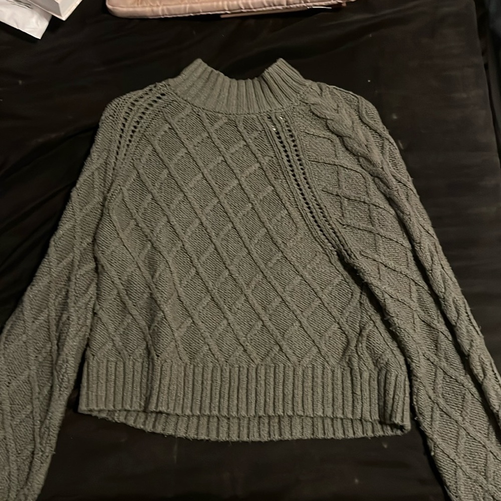 Green knitted sweater